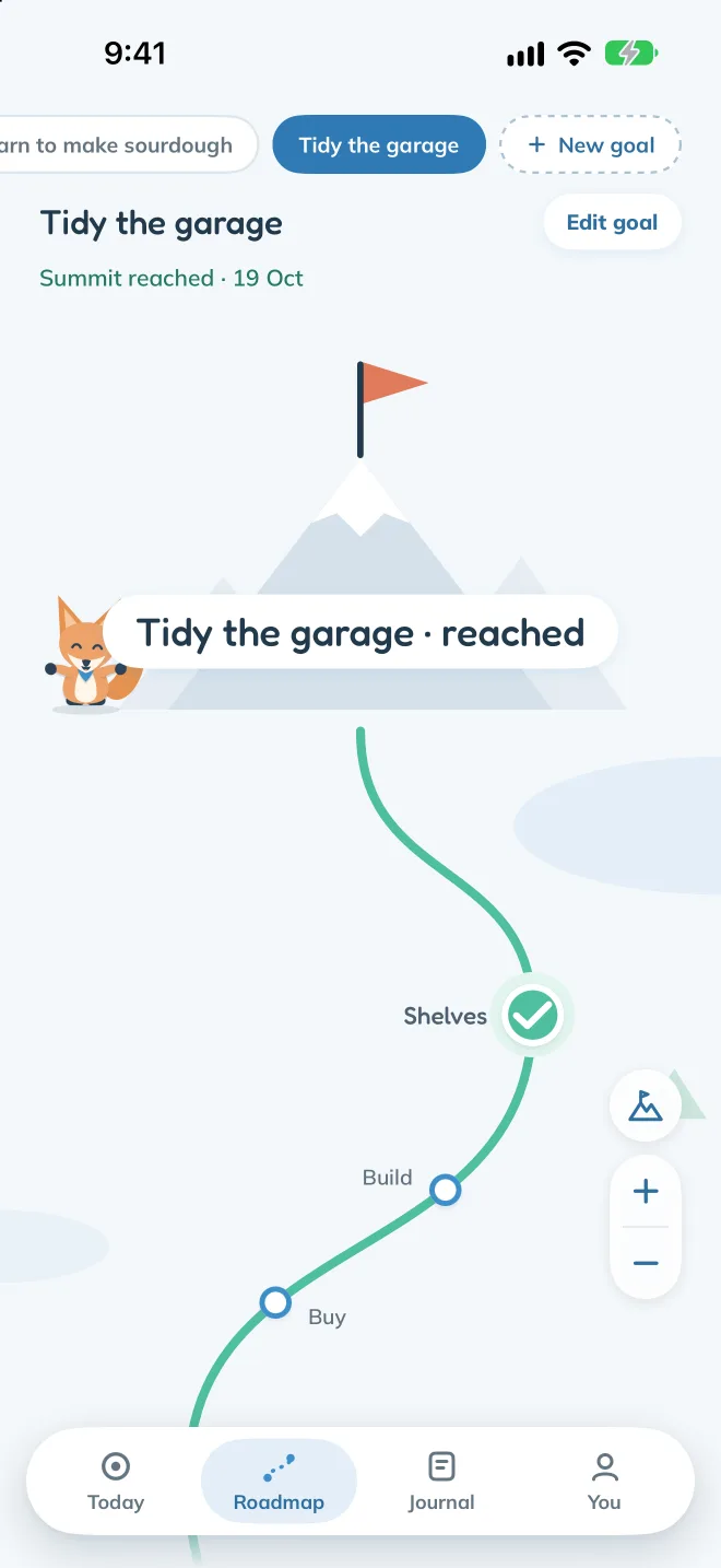 A finished goal in Thaki: Tidy the garage, reached, with the coral flag planted on the peak.